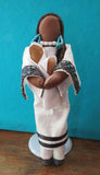 White Calico Ina Storyteller